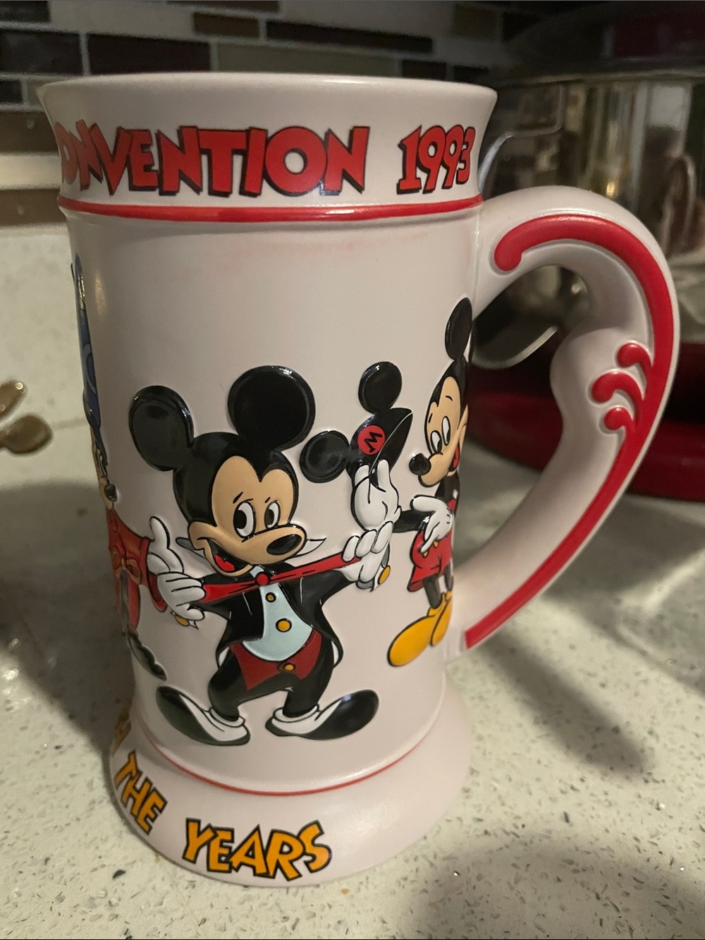 Disney Disneyland Commemorative Ceramic Base Mickey through out the years mug
